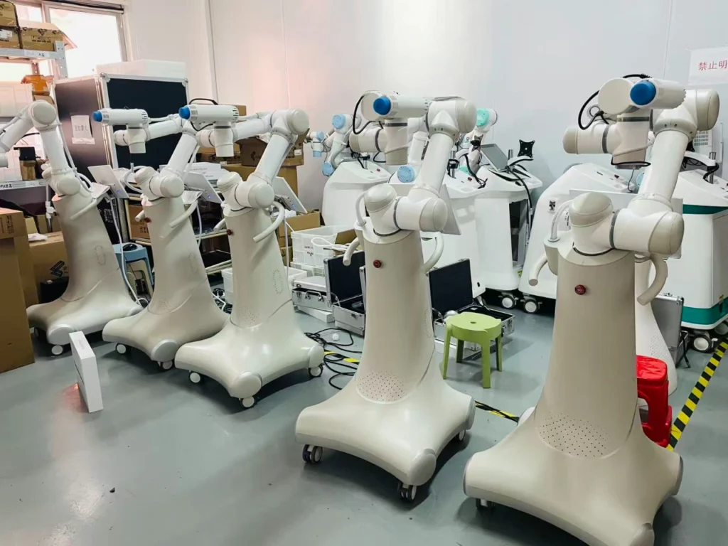Multiple AI smokeless moxibustion robots on the factory production line